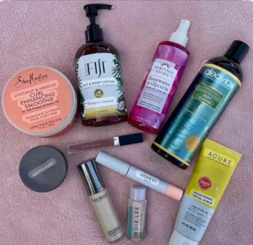 Curated beauty and skincare products on a soft pink background